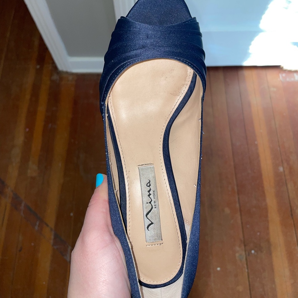 Size 7.5 womens navy blue satin heels. Worn once